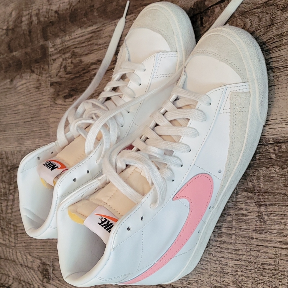 Nike high top leather sneakers.
